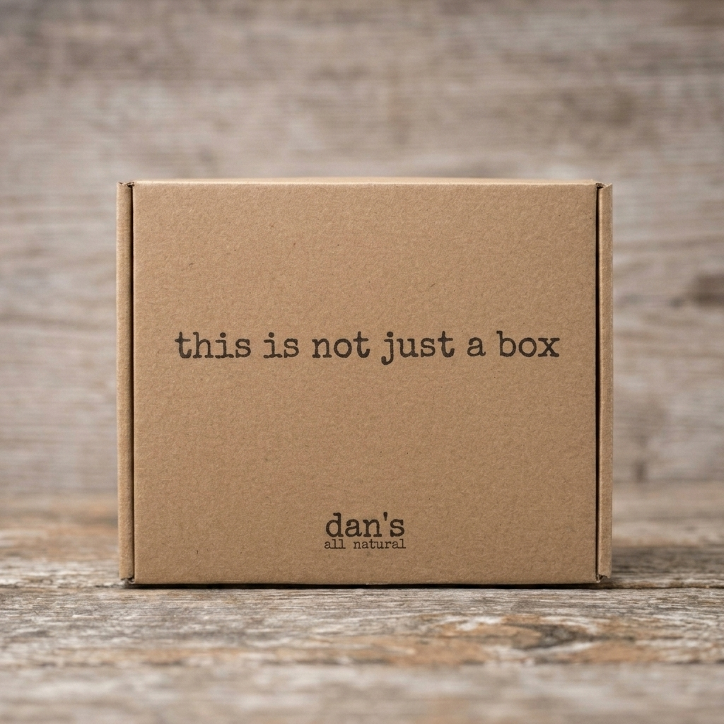 Dan's All Natural kraft box with the words 'this is not just a box'